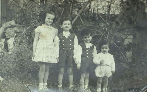 Ezra Aghai: Ezra with his siblings after Passover. Beirut, 1956