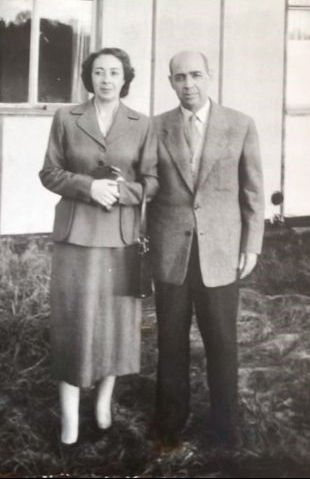 Viviane Bowell: Viviane's aunt and uncle in front of the Bridgend Hostel in Stonehouse. 1957