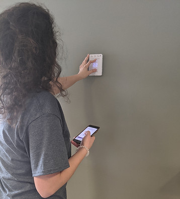 Participant attempting to pair the thermostat