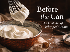 Close-up of whipped cream at three stages in a rustic metal bowl: soft and loose, perfect soft peaks, and overwhipped cream beginning to separate into butter, demonstrating how to properly whip cream.