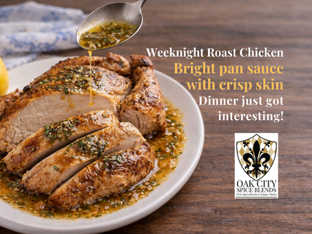 Golden home-roasted chicken with crispy skin, sliced and served on an oval platter with a lemon and fresh herb tarragon pan sauce, styled on a rustic wooden table with soft natural light.