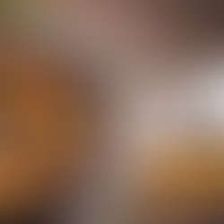 Rustic cast iron pot of Smoky Mountain beef stew with tender beef, carrots, and potatoes on a wooden table with crusty bread.