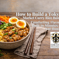 A Japanese-style curry rice bowl with glazed chicken, short grain rice, shredded cabbage, carrots, green onions, and a soft-boiled egg, styled on a rustic wooden table with chopsticks and a light sprinkle of curry powder falling above.
