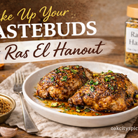 Honey–Ras el Hanout chicken plated in a warm rustic kitchen with Oak City Spice Blends Ras El Hanout seasoning in the background.