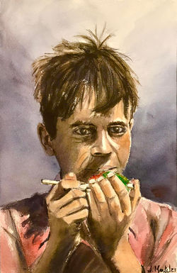 Jeune garçon indien au popsicle