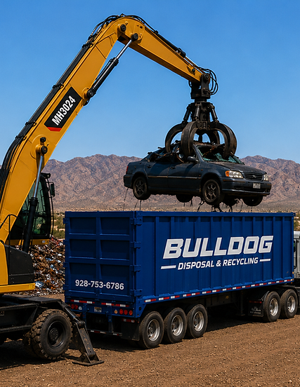Material Handler loading a scrap car into a scrap trailer