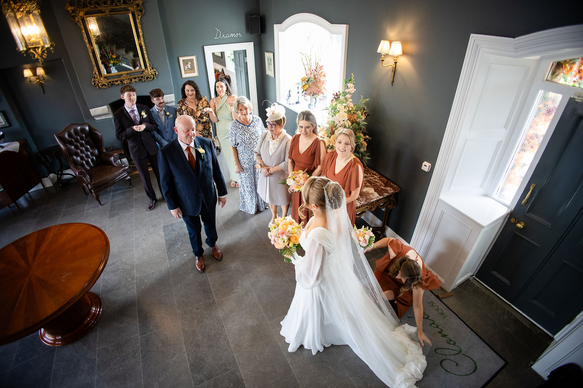 Timeless image of a father’s proud expression during the bridal reveal.
