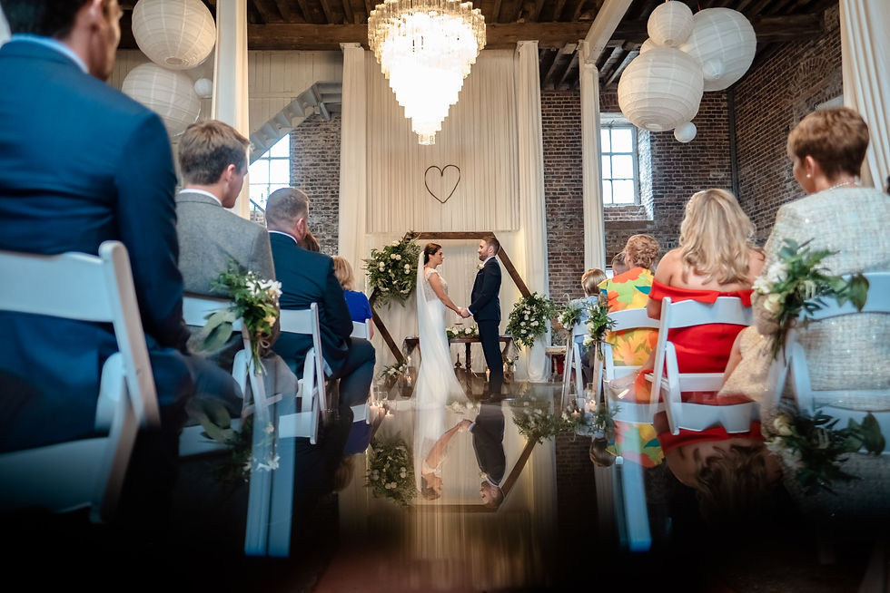 Bride and Groom exchanging vows during ceremony
