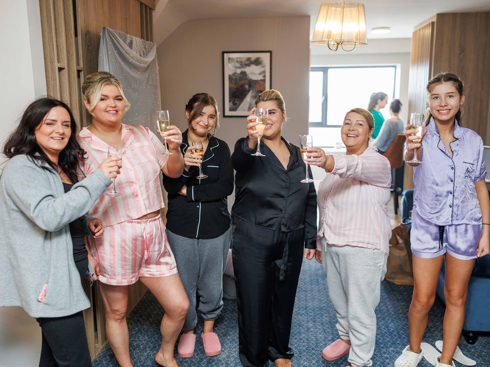 Bride and bridesmaids toasting with champagne at Springfield Hotel