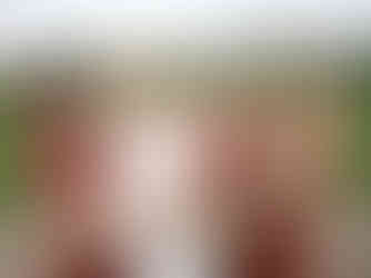 Beautiful wedding couple standing under the trees at Clonabreany House.