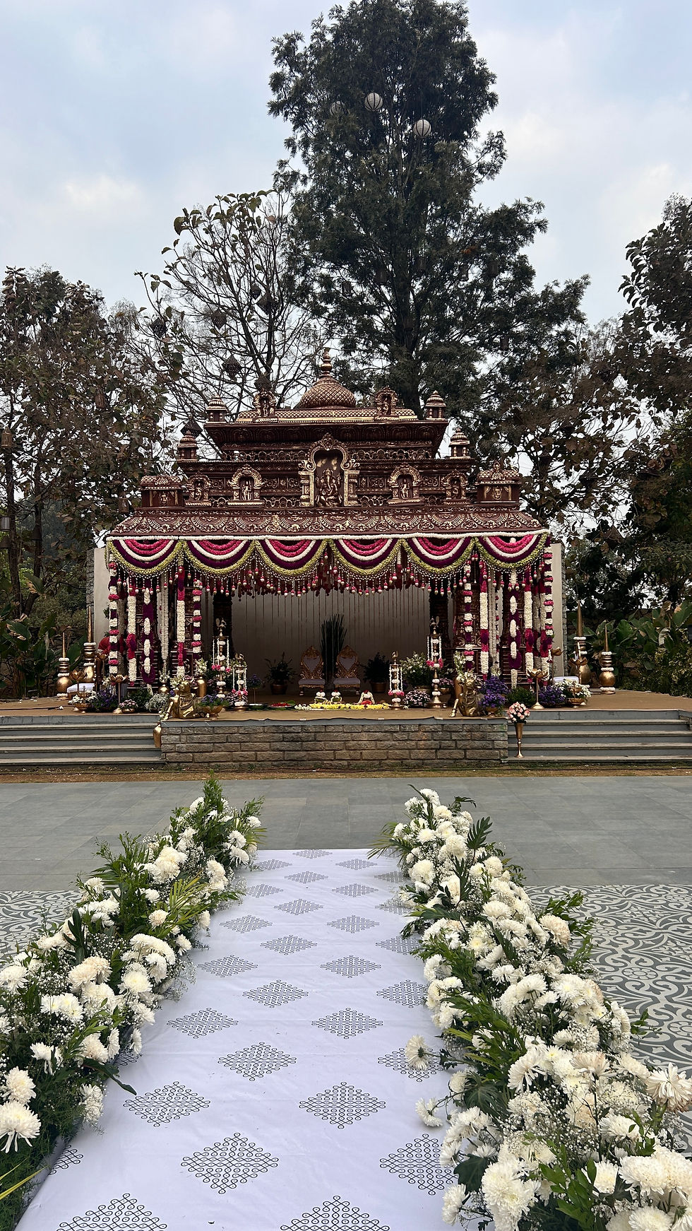 temple-style-wedding-mandap-floral-aisle