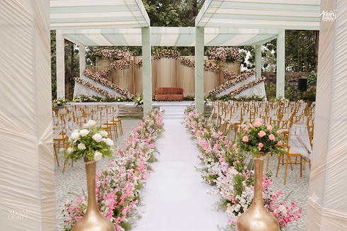 Luxury wedding decor with floral aisle.png