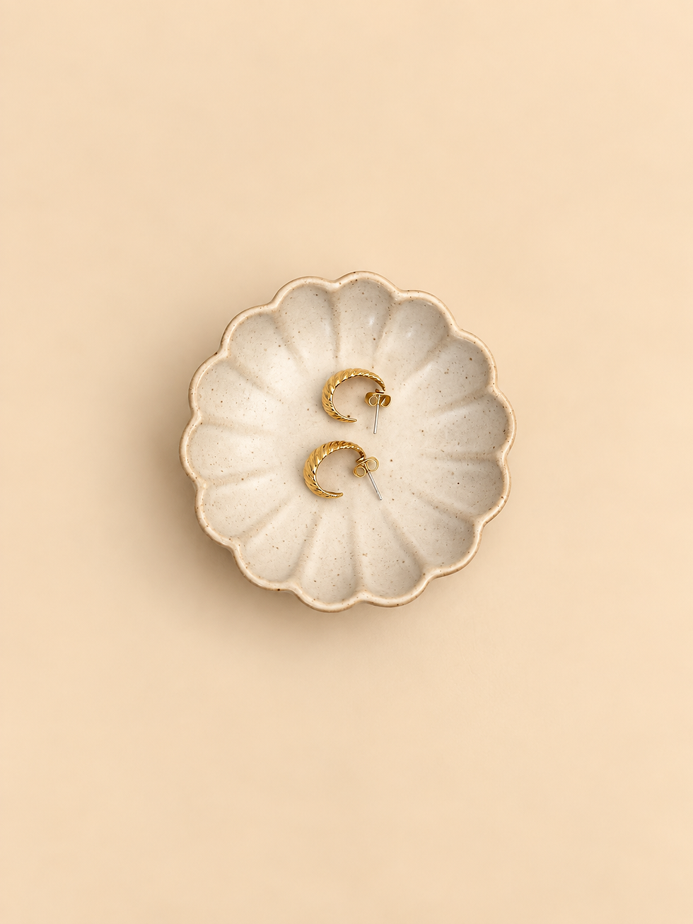 Gold-tone croissant hoop earrings side detail