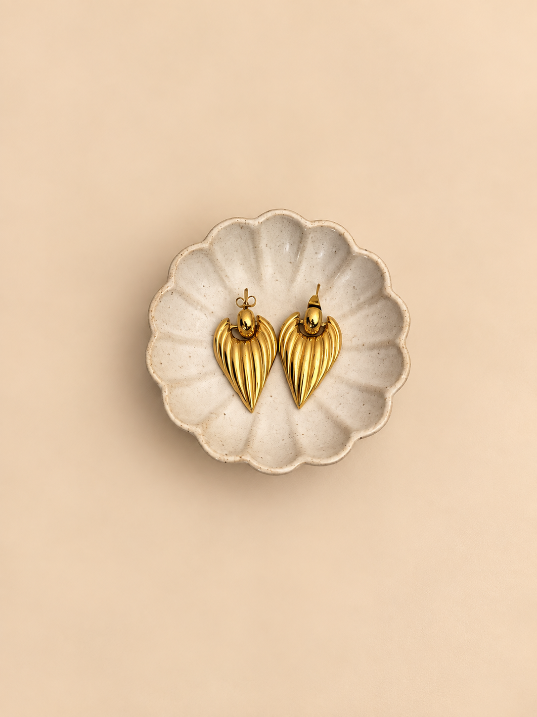 Vintage gold-tone sculptural leaf drop earrings front view