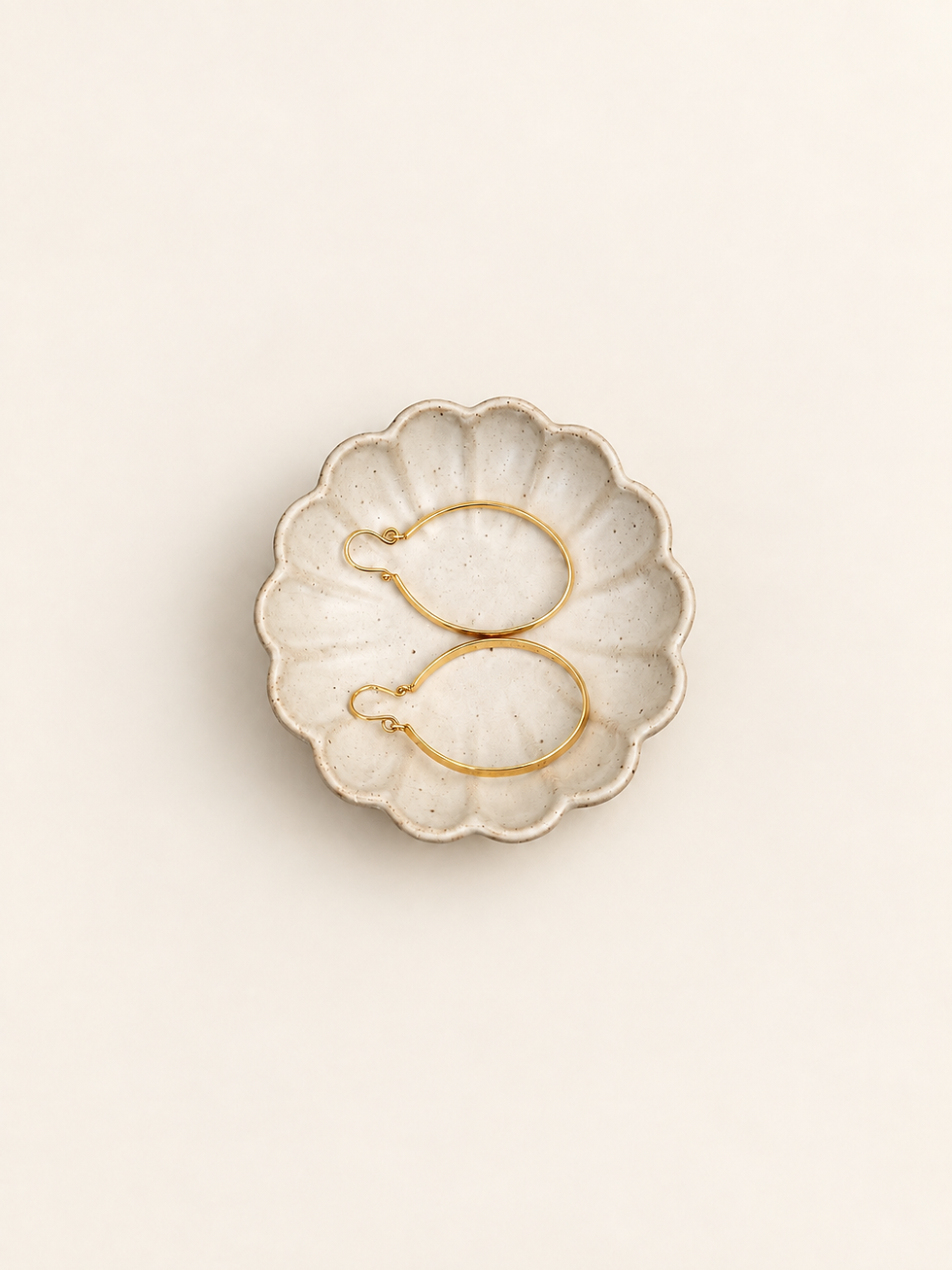 Gold oval hoop earrings side detail