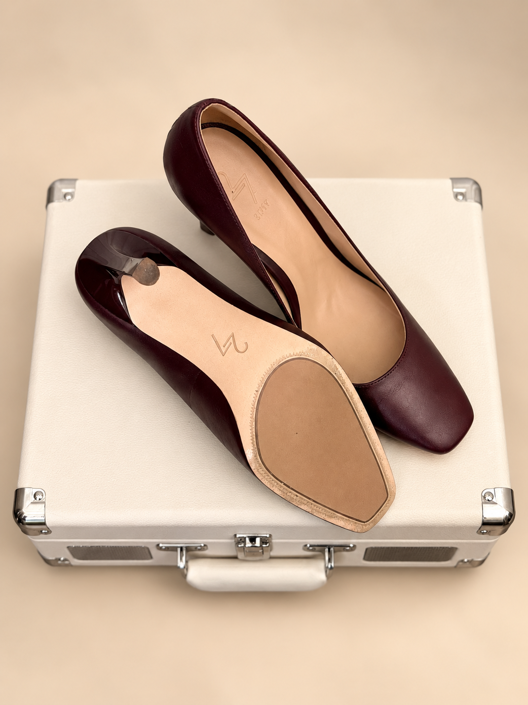 2 Edit burgundy leather pumps with sole detail