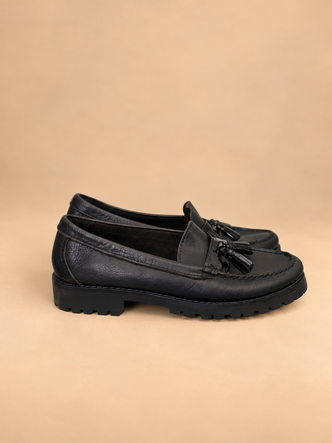 OGGI black leather tassel lug sole loafers side view
