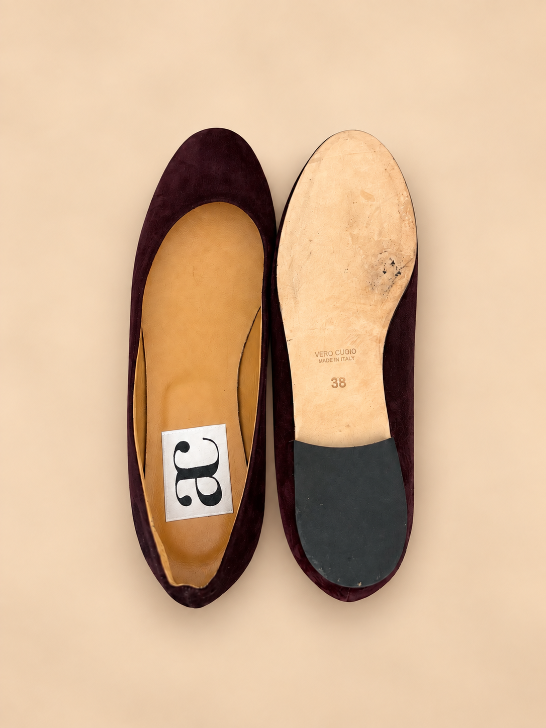 Burgundy suede ballet flats sole and interior detail