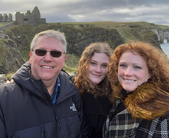 Family photo of Jennifer, husband & daughter