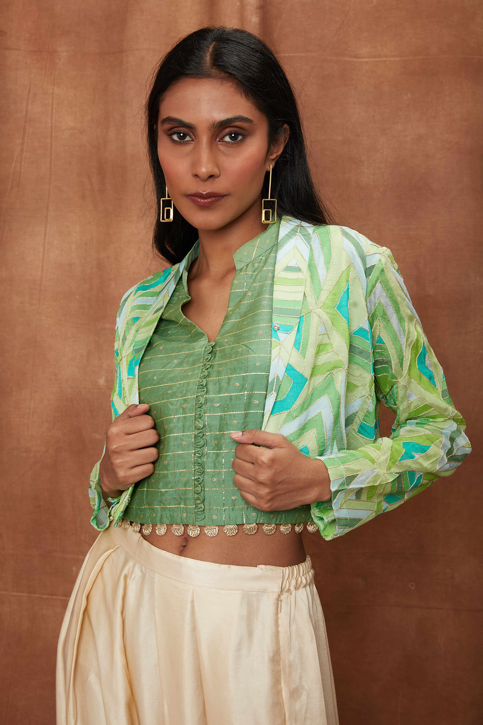 Thumbnail: Dazzle Green geometric short jacket with zari gold checks crop and a draped dhot