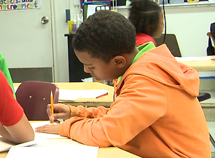 Armontae_class-teacher helping_WS_hands 