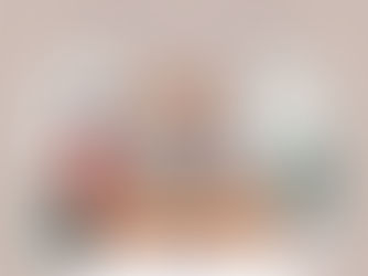 AI generated illustration of man sitting at a desk holding laptop and a woman in the background