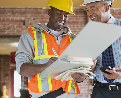 Tradesman and Architect at Construction Site_edited.jpg