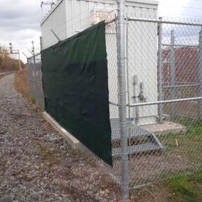 Commercial Chain Link Fence Securing Industrial Equipment