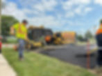 Sikkens Paving team working on asphalt driveway