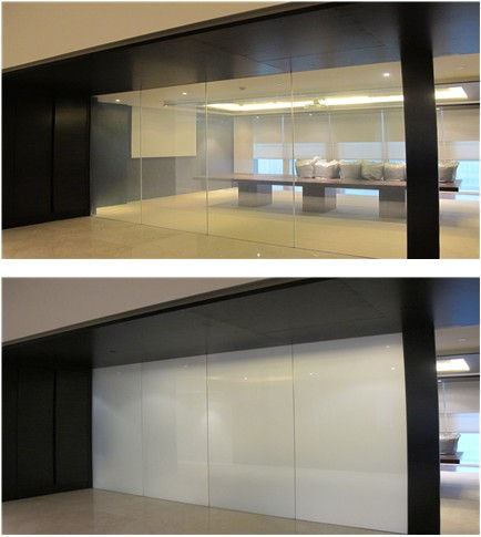 Eye-level view of a modern office window with electronic shading film applied
