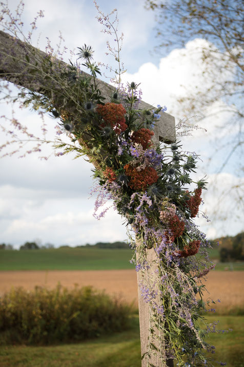 Gorgeous rustic floral arch