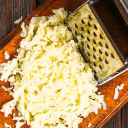 Grated cheddar cheese