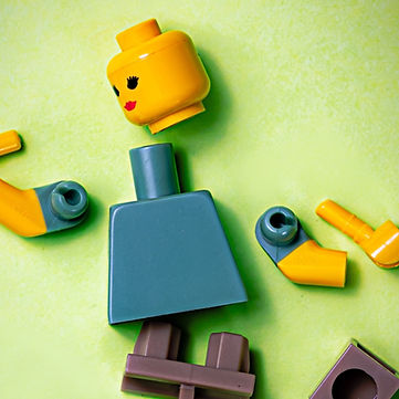 blue orange green and yellow plastic toy_edited_edited_edited.jpg