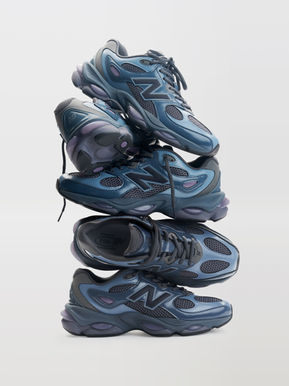 Tênis New Balance 983 em tons de azul petróleo e cinza, empilhados, destacando o logo N e a sola com cápsulas ABZORB SBS