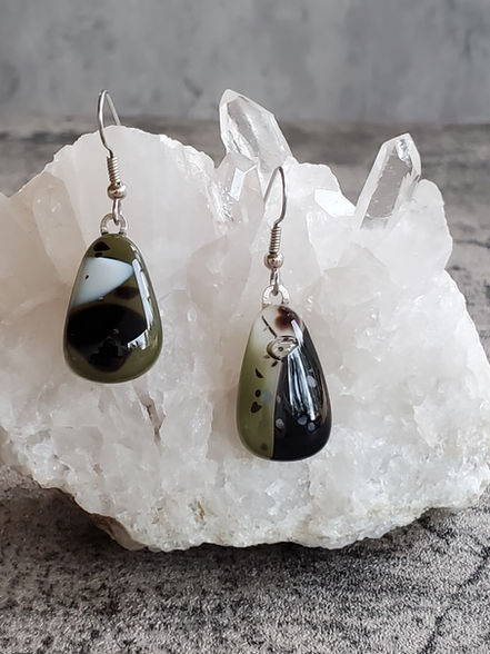 Handmade organically styled black, white and olive fused glass earrings on sterling silver wire.