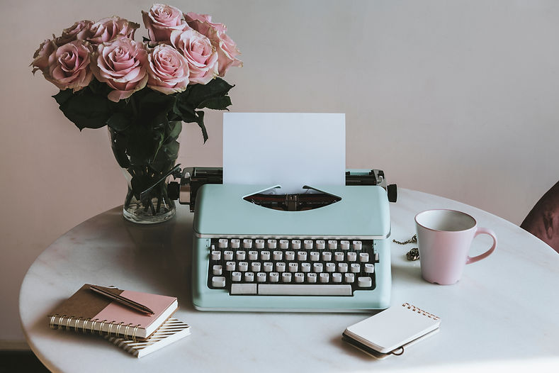 Retro mint typewriter by pink roses.jpg
