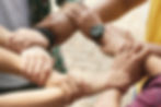 cropped-friends-holding-wrists-each-othe-chain-support-collaborate.jpg