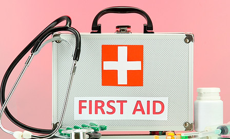 First Aid box on pink BG
