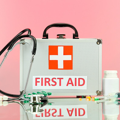 First Aid box on pink BG