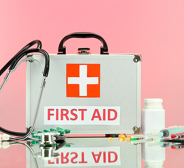 First Aid box on pink BG