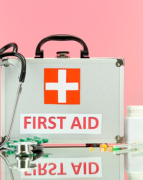 First Aid box on pink BG