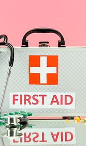First Aid box on pink BG