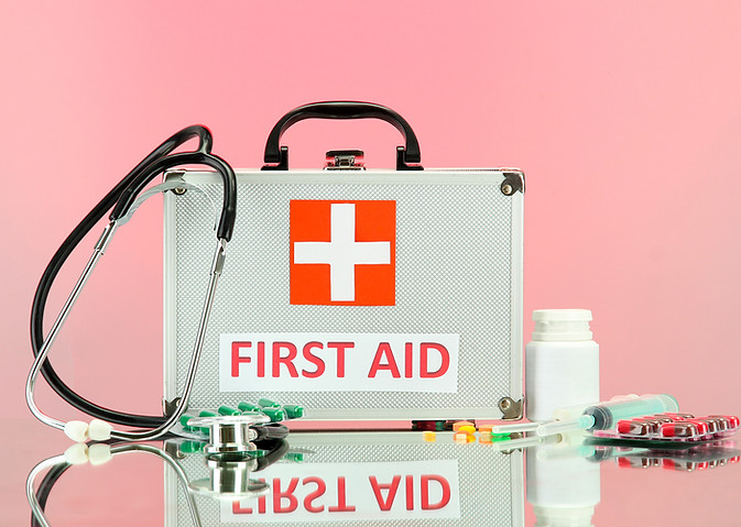 First Aid box on pink BG