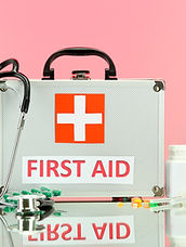 First Aid box on pink BG