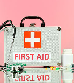 First Aid box on pink BG