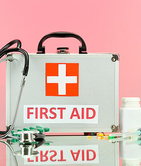 First Aid box on pink BG