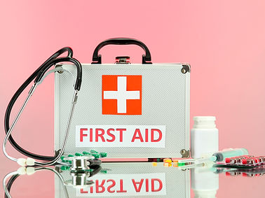 First Aid box on pink BG