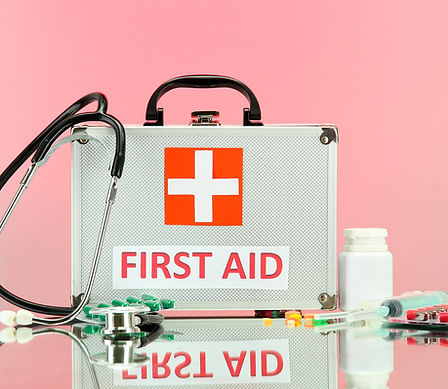 First Aid box on pink BG