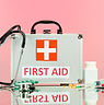 First Aid box on pink BG