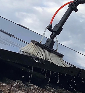 Solar panel cleaning service by Horizon Windows in Muskoka using a soft-brush and pure water system.
